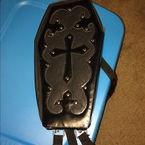 Coffin backpack purse